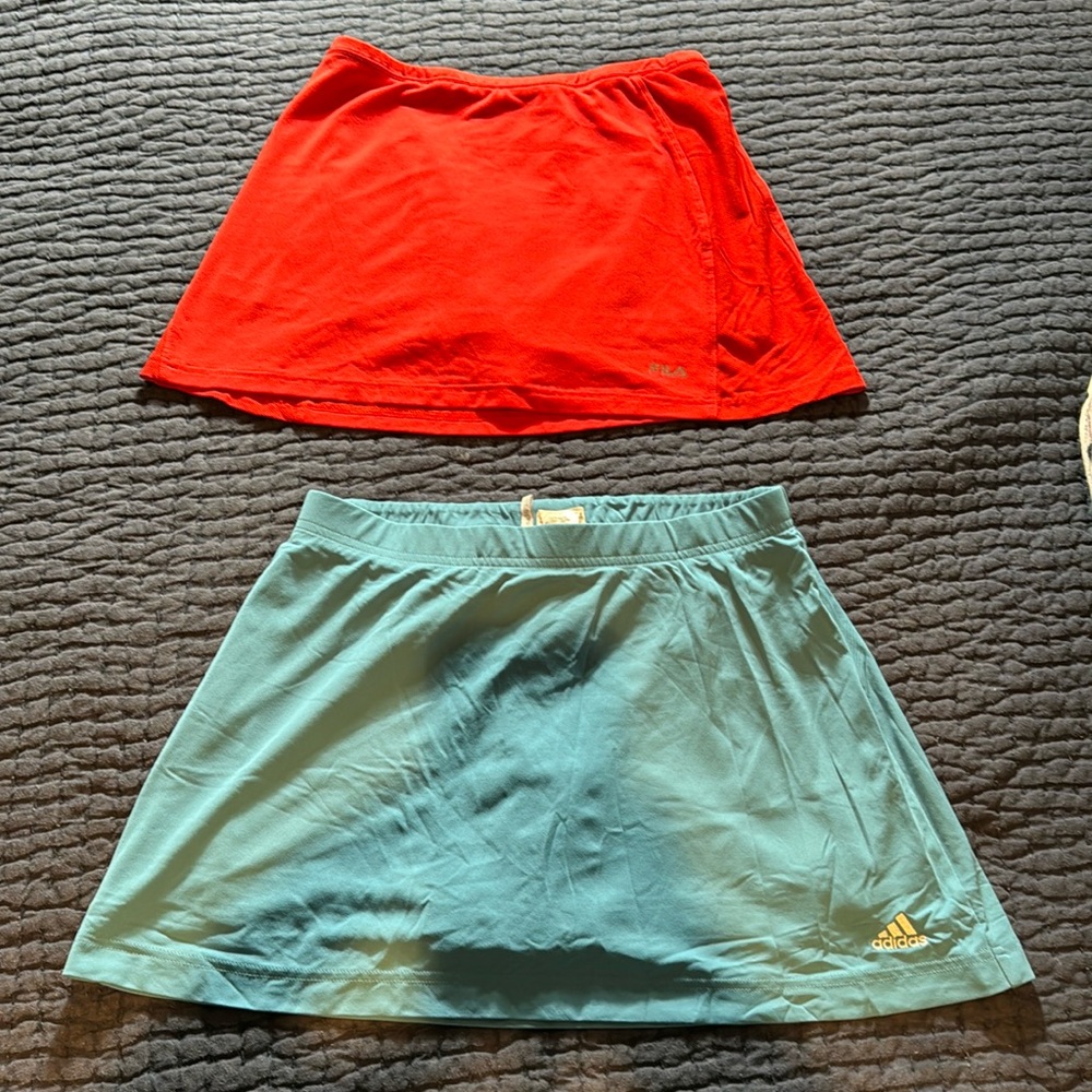 Two tennis skirts with built in bike shorts
